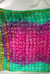 Bandhani Dupatta with Golden Jari palla in Hot Pink and Emerald Green color