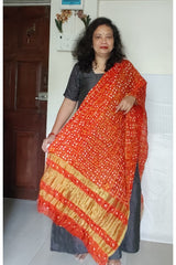 Bandhani Dupatta with Golden Jari palla in Dark / Fanta Orange color